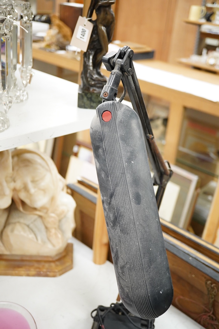 A vintage cast iron anglepoise desk lamp